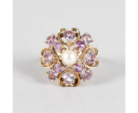 AN AMETHYST AND PEARL 9CT YELLOW GOLD DRESS RING.