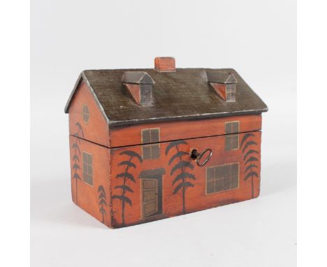 A GEORGIAN PAINTED WOOD TEA CADDY, the roof with chimney, two dormer windows, lift up roof, two tea canisters, the front with