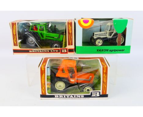 Britains -Yaxon - Three boxed diecast model tractors. Lot consists of Britains #9528 Fiat Tractor; Britains #9526 Deutz Tract