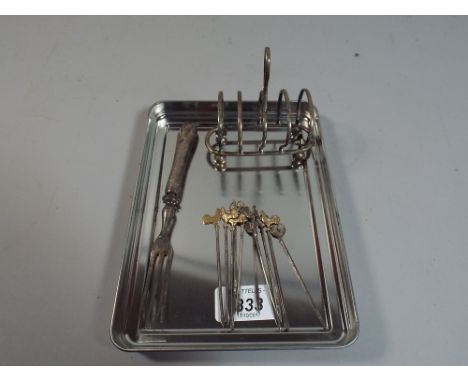 A Silver Four Slice Toast Rack, Silver Handled Fork and Cockerel Cocktail Sticks 