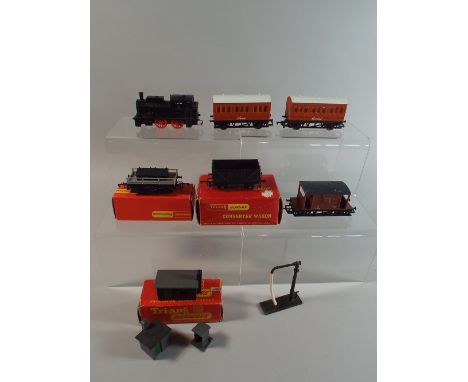 A Collection of Boxed and Unboxed OO Gauge Tri-Ang Hornby Items to Inlcude a Clockwork 0-4-0 Loco, Two Thomas Coaches Annie a