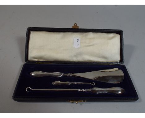 A Cased Silver Handled Button Hook/Shoe Horn Set