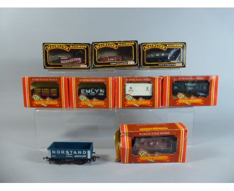 A Collection of Nine Boxed OO Gauge Hornby and Mainline Railways Wagons to Include Mainline 37419 Three Plank LMS Grey, 37457