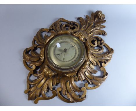 An Ornate Gilt Framed Aneroid Wall Barometer, Glued to Side, 61cm high 