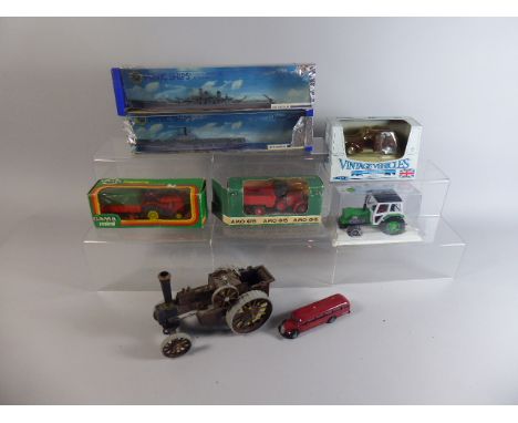 A Collection of Seven Boxed and Unboxed Vehicles to Include Two Minic Ships, Russian Truck, AMA Tractor, Kit Built Steam Trac