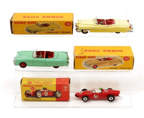 Dinky Toys 131 Cadillac Tourer, yellow body, cerise interior with seated painted plastic driver figure, cream ridged hubs, bo