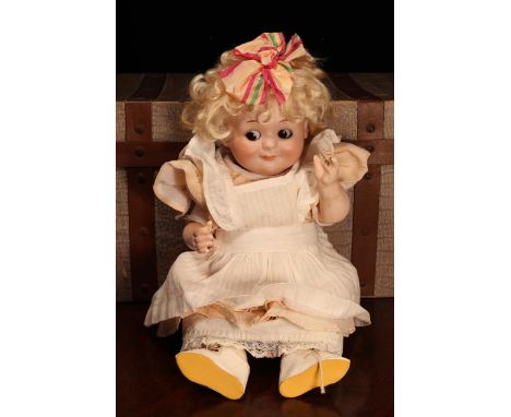 An Armand &amp; Marseille (Germany) bisque head novelty Googly-eyed doll, the bisque head with painted features including bro