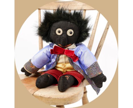 Toys From The Attic Part II - an early 20th century stuffed cloth black doll, the head applied with black boot button eyes, p