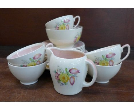 A Susie Cooper tea set, six setting, lacking one tea plate