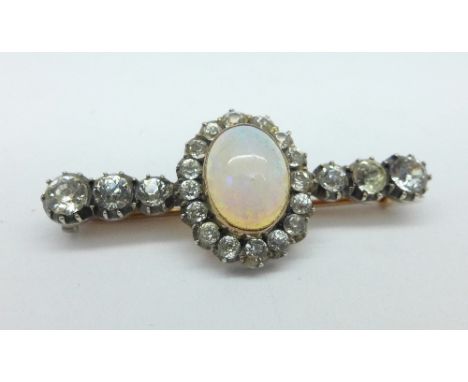 A yellow metal, opal and paste stone set brooch, 42mm