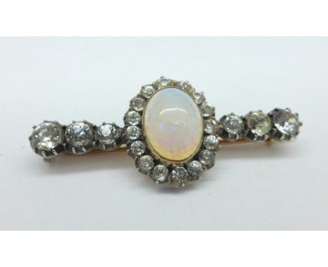 A yellow metal, opal and paste stone set brooch, 42mm