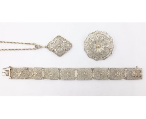 Silver open-work bracelet London import marks stamped S & K. H, similar pendant necklace stamped sterling and brooch stamped 