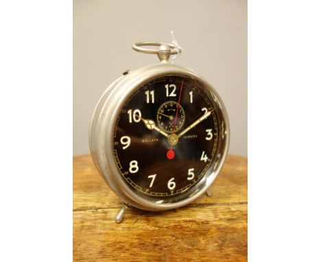 Early to mid 20th century 'Goliath Repeater' circular polished metal alarm clock, black dial with Arabic numerals, subsidiary