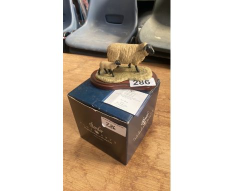  Sale Item:    BFA ORNAMENT SUFFOLK EWE &amp; LAMB &amp; CERT  Vat Status:   No Vat   Buyers Premium:  This lot is subject to