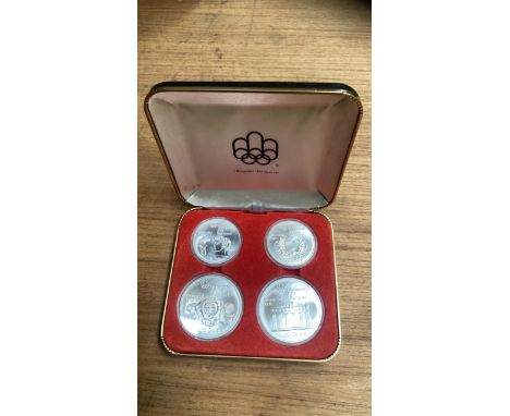  Sale Item:    BOX 4 MONTREAL OLYMPICS 1976 COINS  Vat Status:   No Vat   Buyers Premium:  This lot is subject to a Buyers Pr
