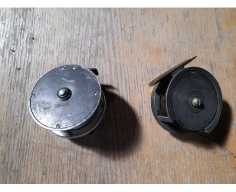  Sale Item:    2 FISHING REELS- FARLOWS &amp; ANOTHER  Vat Status:   No Vat   Buyers Premium:  This lot is subject to a Buyer