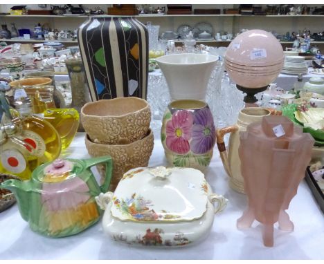 An Art Deco pink glass table lamp and 1930's pottery