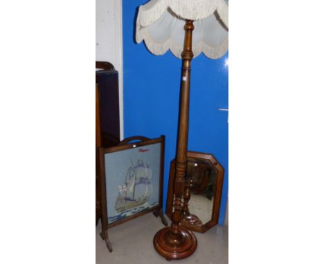 A walnut turned fluted standard lamp; a needlework firescreen; a bedroom chair; a wall mirror