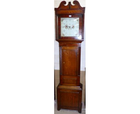 An early 19th century oak and mahogany longcase clock with swan neck pediment and square rope twist columns, similar columns 