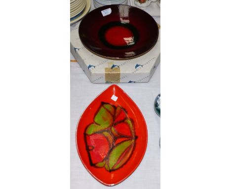 A 1970's Poole "Mars" circular dish, diameter 10½"; a Poole ovoid orange and green dish, length 12"