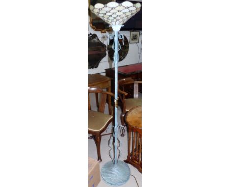 An Art Nouveau style metal standard uplight with Tiffany style shade; a Tiffany style centre light shade