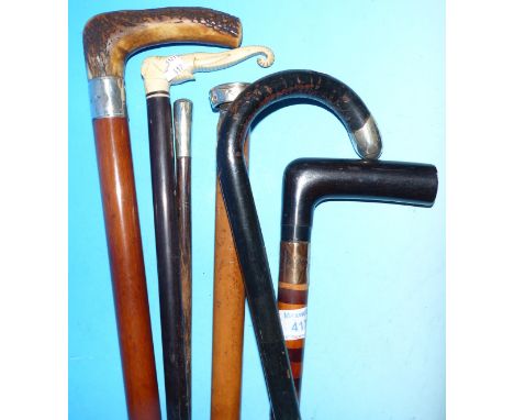 A collection of 6 vintage walking sticks