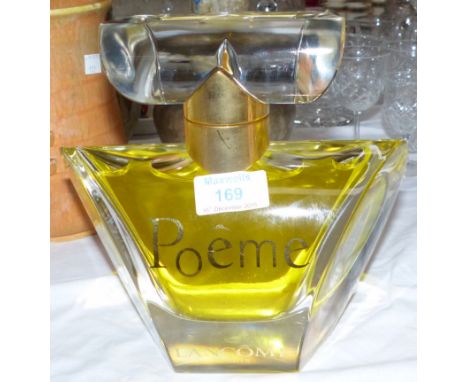 A large vintage factice bottle "Poème" by Lancôme, Paris