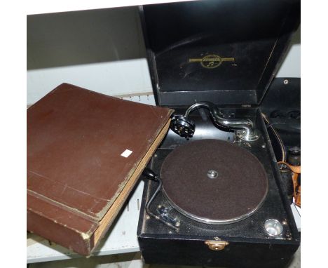 A 1920's Columbia table top gramophone and an album of 78 records