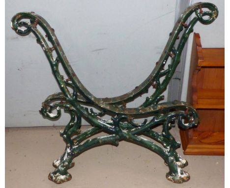 A pair of 19th century rustic cast iron garden bench ends