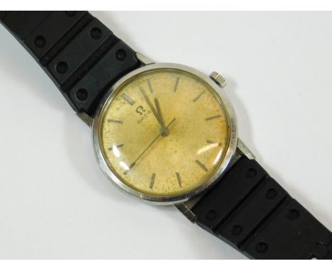 OMEGA WATCH. A stainless steel cased Omega wristwatch, the champagne coloured dial with baton numerals, straight hands & swee