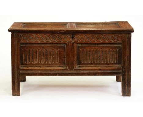 An oak chest, first half 20th c, with two nulled panels to the front, 56cm h; 42 x 101cm  One of the two panels in the lid sp