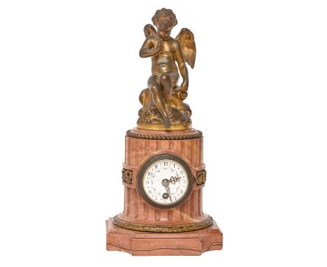 A French giltmetal mounted marble mantle clock, late 19th c, with enamel dial, 26cm h, key  Very minor chips to bottom of bas