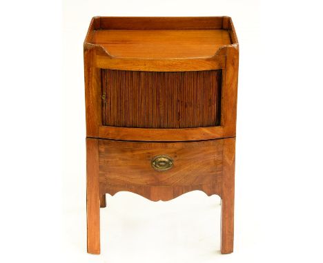 A George IV bow fronted mahogany tray top commode, with tambour shutter and apron-drawer, 76cm h; 48 x 51cm  Re-polished; sma