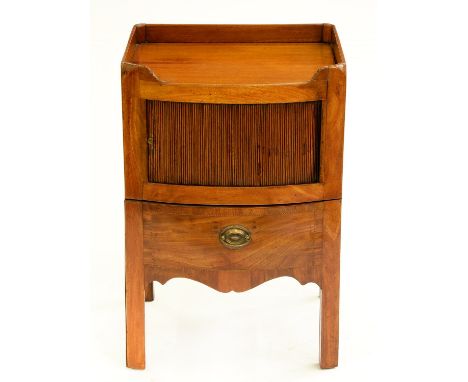 A George IV bow fronted mahogany tray top commode, with tambour shutter and apron-drawer, 76cm h; 48 x 51cm  Re-polished; sma