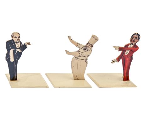 A set of three Art Deco ivorine figural menu holders, c. 1930, as a chef, a&nbsp;maître d'hôtel and a waiter, polychrome pain