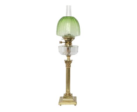 A brass Corinthian column oil lamp, c1900, with faceted glass fount, brass Hinks No 2 lever burner and etched green glass sha