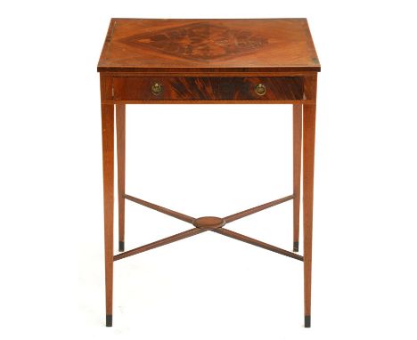 An Edwardian mahogany side table, the quarter veneered top crossbanded in rosewood, the drawer to the frieze cedar lined, on 