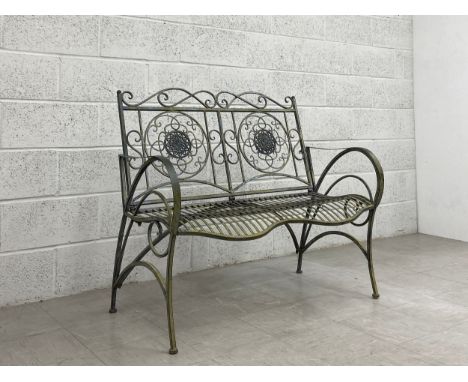 A contemporary 19th century style aluminium garden bench having a scrolling crested top rail and openwork splat with curved a