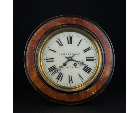 A French 19th century wall clock having a white enamelled dial bearing Roman numerals and Gardon Besnard Doue La Fontaine mak