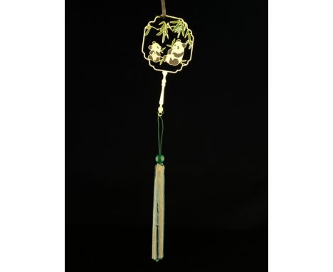 A contemporary Chinese bookmark having a brass and enamelled openwork finial depicting pandas and bamboo in a fitted box. L.1