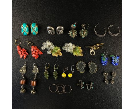 A mixed collection of jewellery to include fourteen pairs of carved coral, turquoise, cut glass, filigree and vintage Kenneth