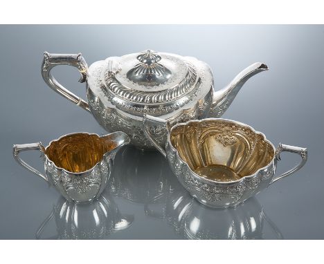 EARLY 20TH CENTURY SILVER PLATED THREE PIECE TEA SERVICE
maker's mark L & Co., comprising a teapot, sugar and cream, all embo