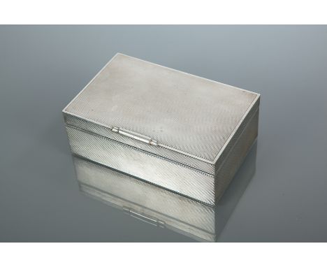 SILVER CIGARETTE BOX
maker W H Manton Ltd., Birmingham 1959, engine turned body and lid, approximately 349g (base loaded), 13