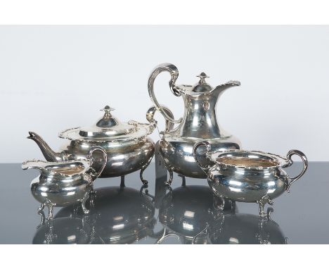 GEORGE V SCOTTISH SILVER FOUR PIECE TEA SERVICE
maker George Edwards & Sons, Glasgow 1921, hot water pot 1917, of squat bulbo