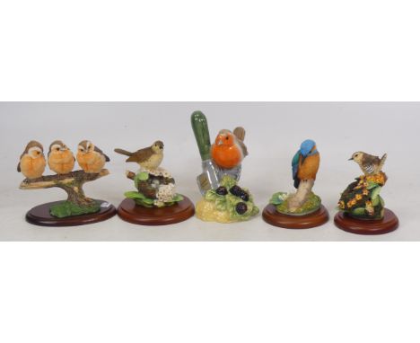 Beswick Robin on Trowel JBB19 and Three Border Fine Arts to include Baby Robins WB21, Thrush with Nest 541680, Wren with Nest