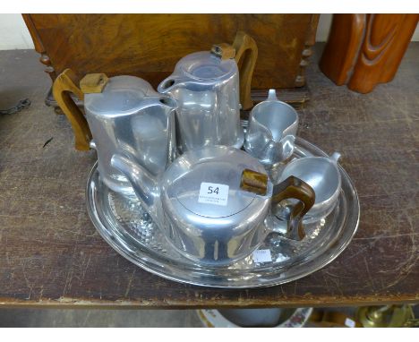 A Picquot Ware tea and coffee service and associated tray