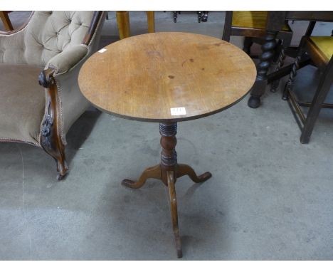 A Victorian mahogany tripod wine table