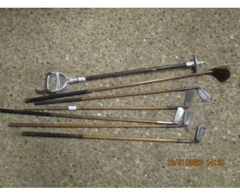 GROUP OF HICKORY SHAFTED GOLF CLUBS AND SHOOTING STICK