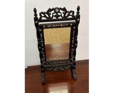 A Chinese style bathroom mirror with pierced frame and mother of pearl inlay (H45cm W24cm)