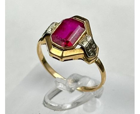 A ruby ring, size M with makers mark to shank. Size M.